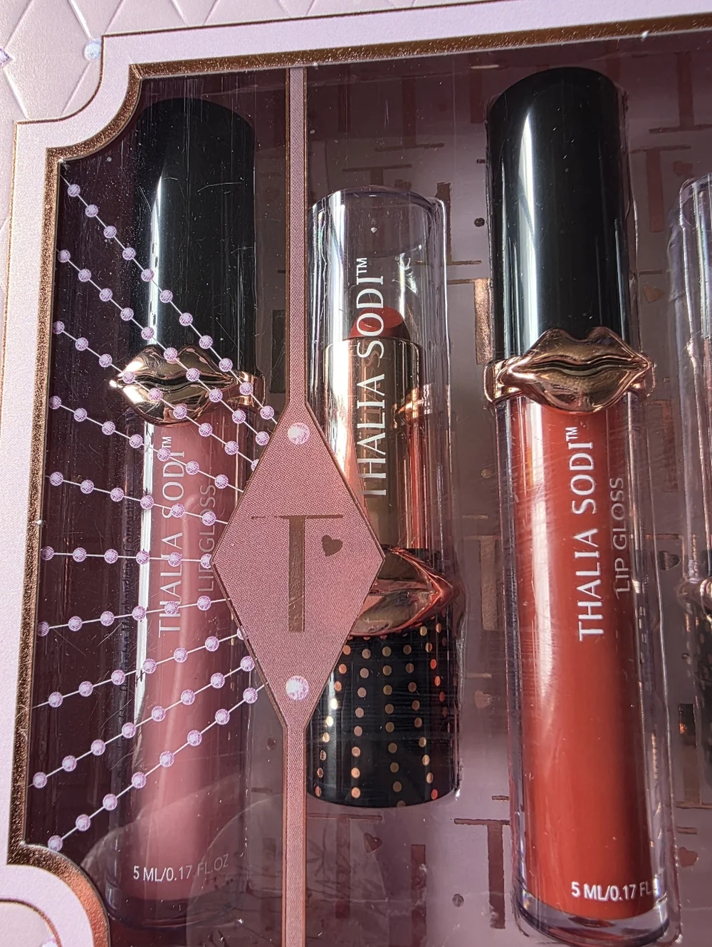 Thalia Sodi Charmed Kisses 2-piece lipstick and 3-piece lip gloss collection.